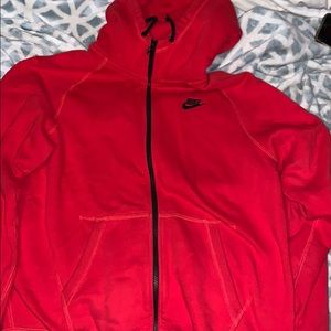 Red and black Nike zip up